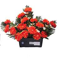 Devant de tombe fleurs artificielles cimetière chrysanthèmes et alstroemerias Orange
