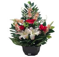 Grande Vasque de Renoncules fleurs artificielles pour le cimetière H 52 cm Lg 44 cm Fushia